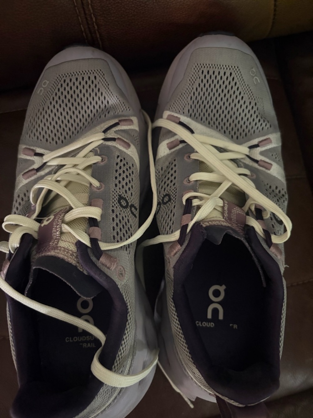 On Running Women's Sneakers in Dark Navy and Mauve Accent